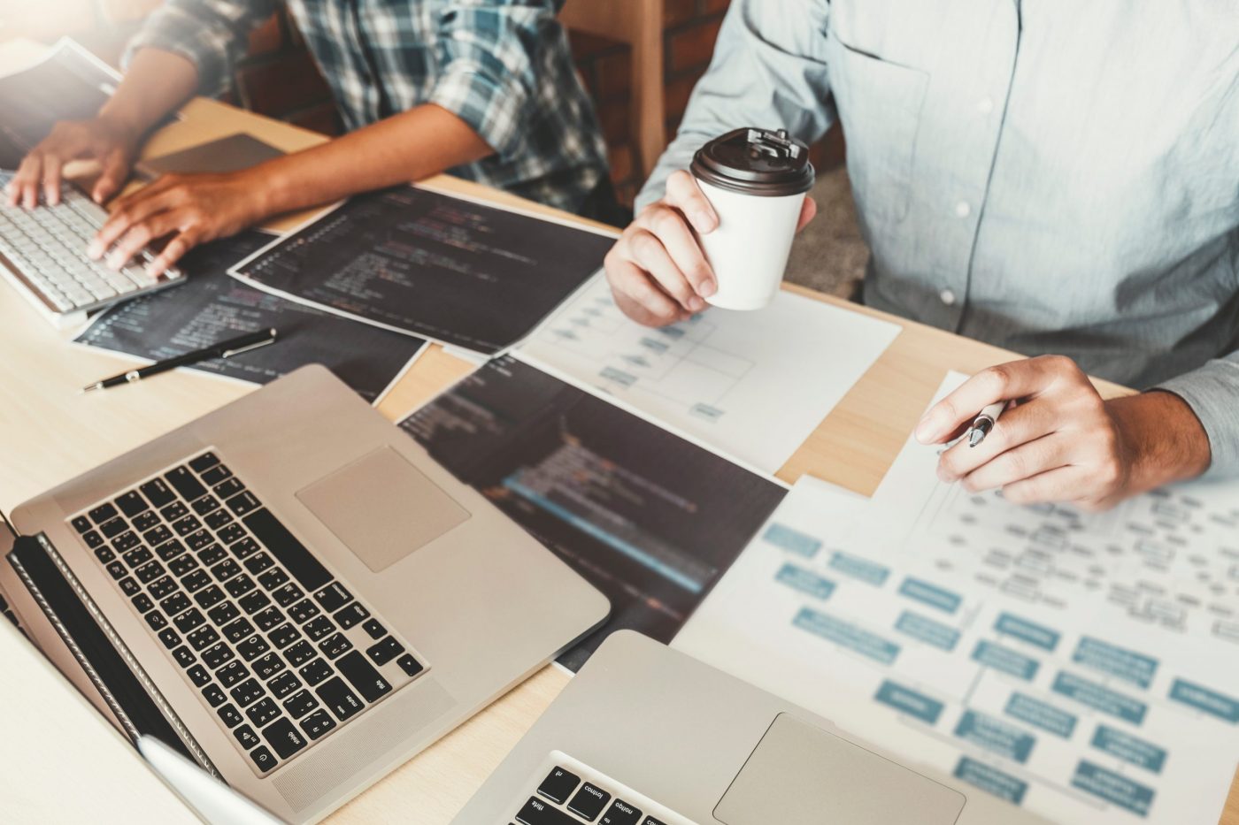 Developing programmer Team Development Website design and coding technologies working at software company office